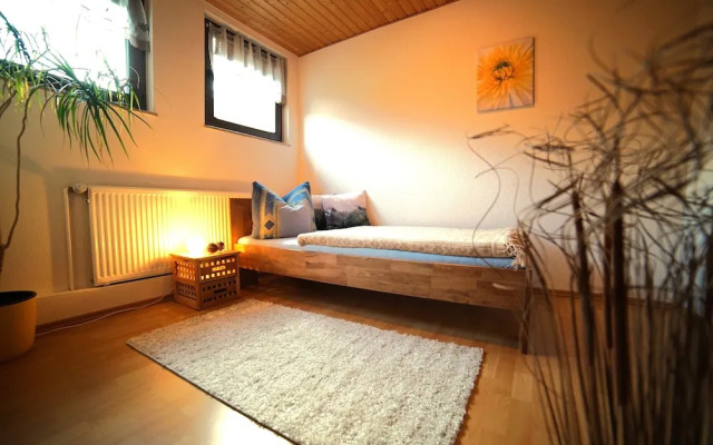 Ferienwohnung im Wald mit Kamin