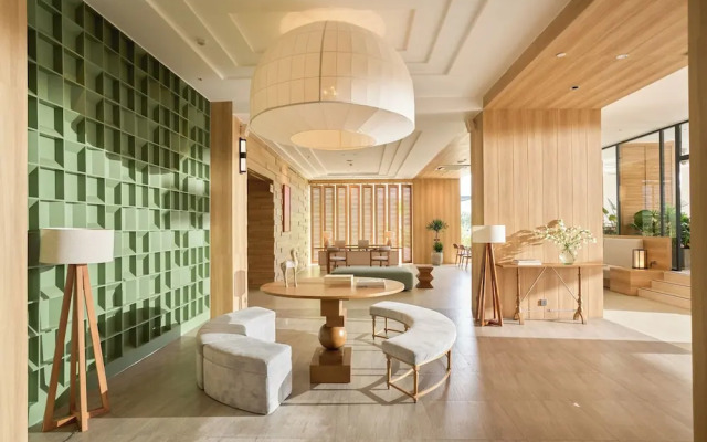 Signature By M Village Beachfront Hotel
