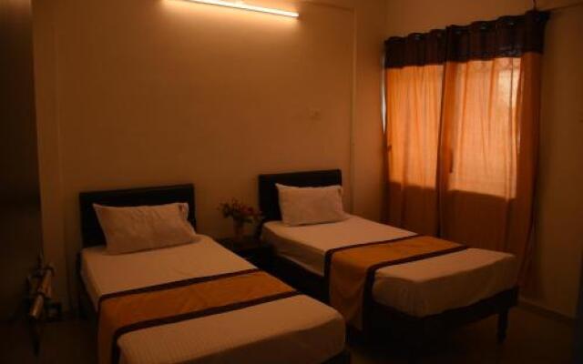 JK Rooms 132 Parkland Service Apartment