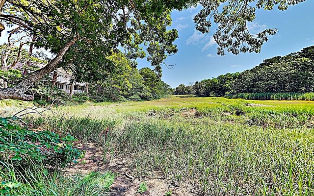 Woodsy Cape Cod Home by RedAwning