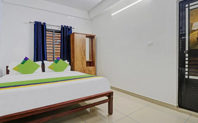 Treebo Nirupama, 750m from Aluva Railway station