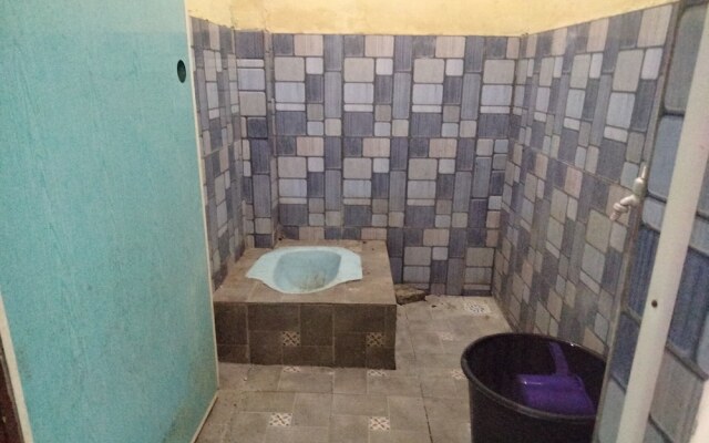 SPOT ON 93460 Lewi Family Guest House Near GBKP Bangun Mulia Km. 11