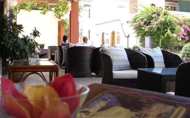 Astra Village Apartments & Suites