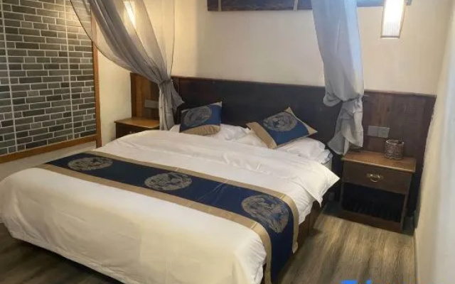 Xishuangbanna Jinghong Plum Blossom Courtyard Hotel (Poshui Square Branch) – Guest Rooms – Xishuangbanna