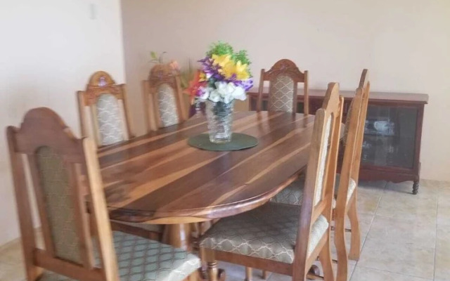 Poinciana House