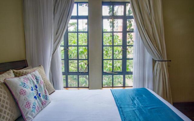 Peaceful, Spacious, Open-plan 2br apartment set in mature garden