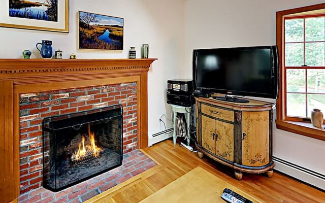 Woodsy Cape Cod Home by RedAwning