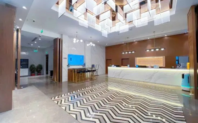 Magnotel Classic hotel (Jiangyin Qingyang Town Ningxiu Lake Park Store) — фото 2