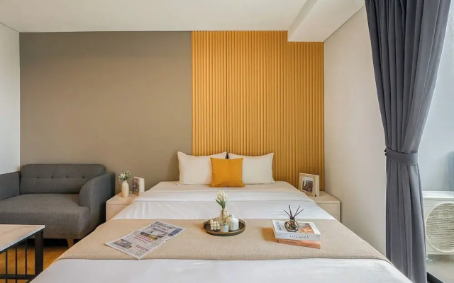 Elegant And Homey Studio At Apartment Capitol Suites