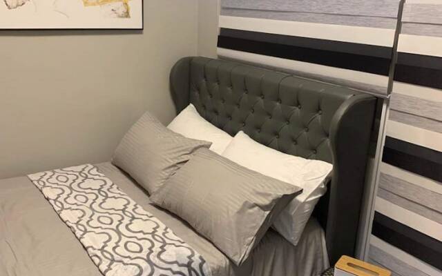 OYO 936 Yumis Condotel Trees Residences