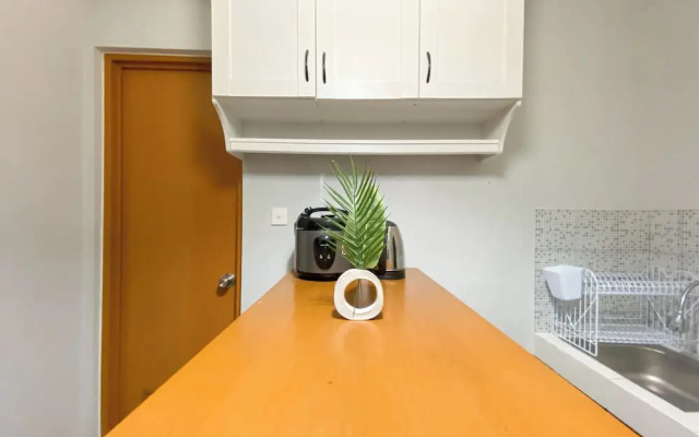 Minimalist And Cozy 1BR at Royal Heights Apartment