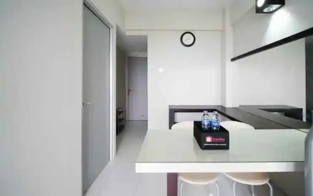 Comfy and Homey 2BR at Dian Regency Apartment By Travelio