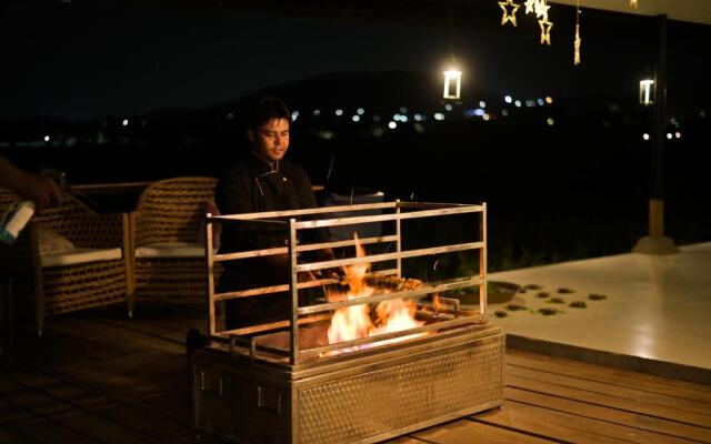 SaffronStays Onellaa, Nashik - infinity pool villa surrounded by a vineyard