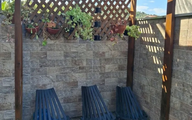 Refúgio Romântico entre o Verde e o Mar