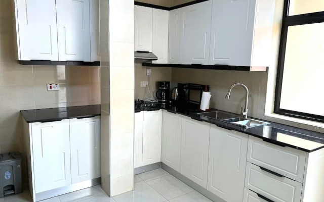 Q-Plus Apartments