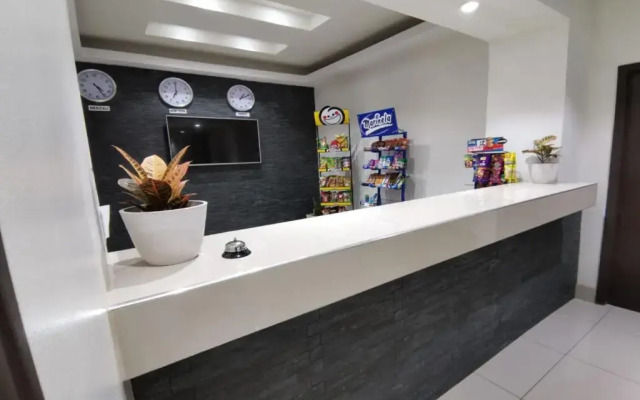 Capital O Baja Place Inn