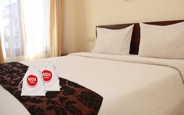 Nida Rooms Dewi Sartika 30 Tuban Kuta at Surya Inn