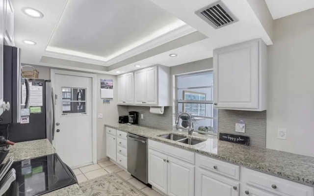 Cozy Home With Sunroom, Pool and Steps to Beach