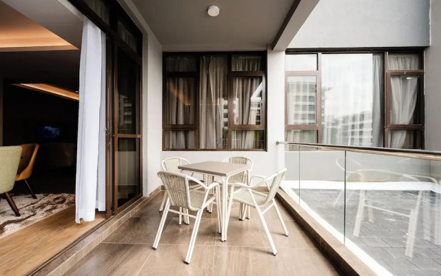 Trademark Suites at Enaki Town