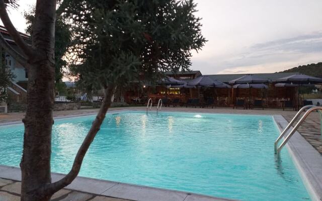 Отель Caretta Village