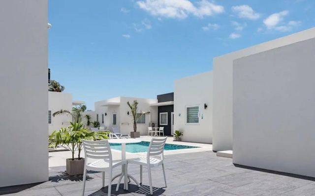 The Palm Leaf Apartments
