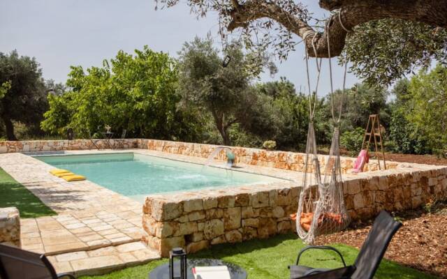 Trullo Nonna Netta con Piscina Idromassaggio e Area Giochi
