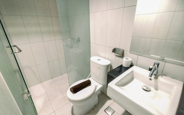 Homey Designed 2BR in City Center at Praxis Apartment