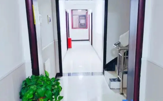 Zhoukou Kaixinyuan Hotel (Baicheng Railway Station)