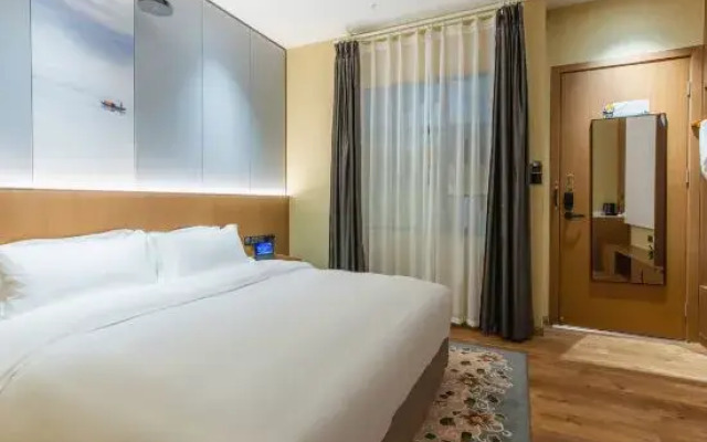 New Bingkai International Hotel (Wetland Park Yellowstone North Station)