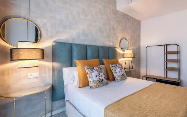 Apartamentos Puerta Elvira Suites 3000