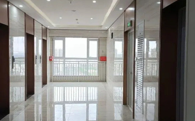 Spring Apartment (Linyi Beicheng New Area Rongchang Yuelinglong Shop) – Hotel Rooms – Linyi