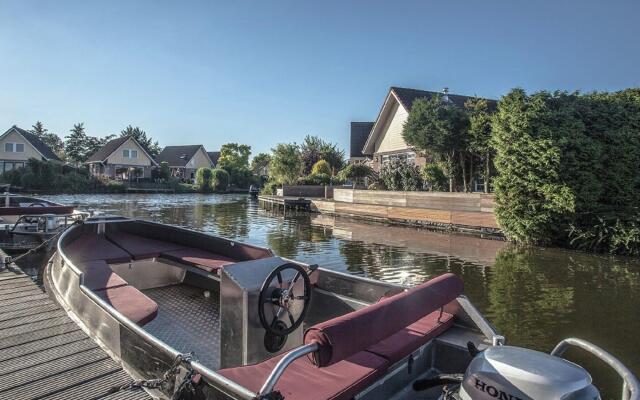 Beautiful house with jetty on inland water, near IJsselmeer
