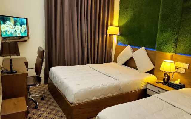 Hotel Holy City BD