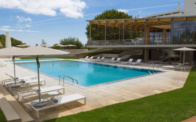 Ozadi Tavira Hotel
