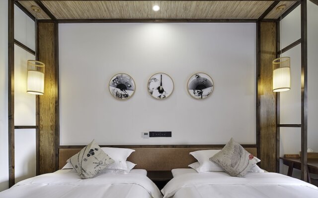 Floral Hotel Deqing Qinzizaiju