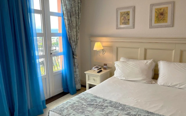 Suite com cozinha dentro de hotel ILCTOP