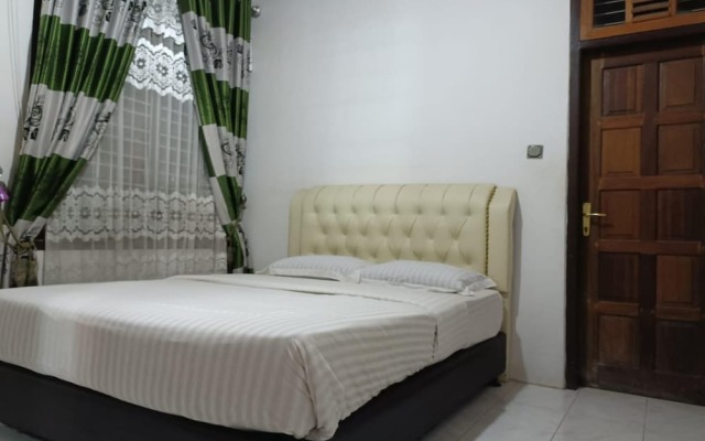 OYO 93706 Penginapan Syariah Hj. Kenan