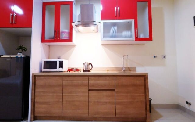 Family Studio Room at Ancol Mansion Apartment By Travelio