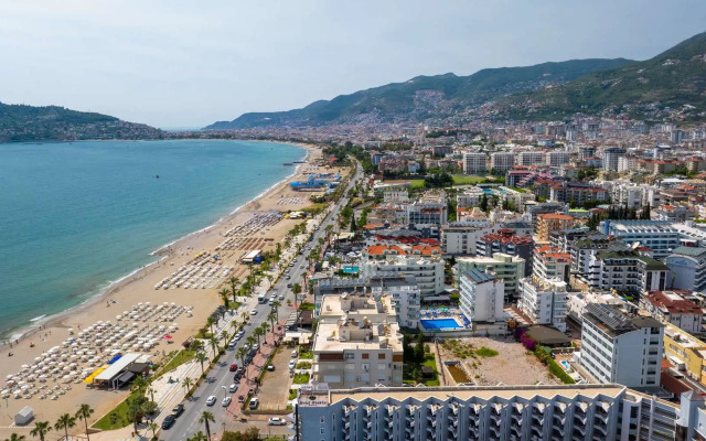 Апартаменты 2+1 Qoople Begonia в 20 метрах от моря