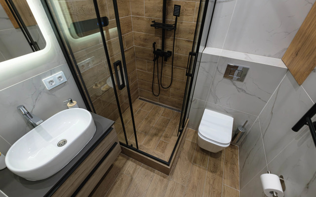 Квартира Новая студия в 5 минутах от ТРЦ Аура