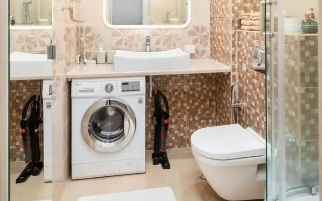 Na Komendantskom Prospekte 64k1 Apartments