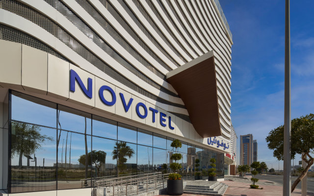 Отель Novotel Jumeirah Village Triangle