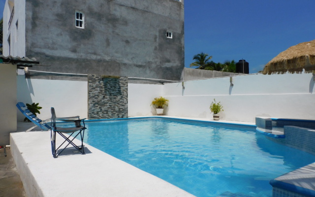 Отель Casa de Huespedes Nayomi By Rotamundos