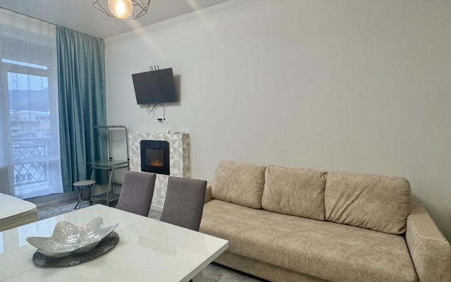 Квартира Просторная студия с террасой напротив отеля Мариотт