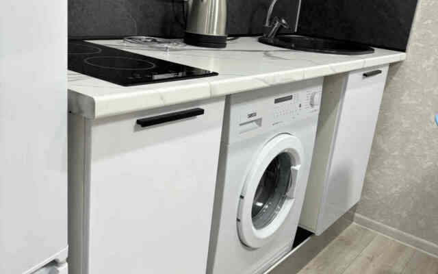 V Tsentre Goroda Apartments