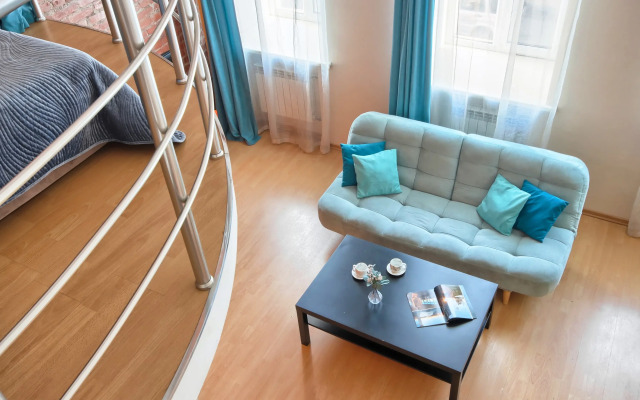 V Tsentre Goroda Apartments