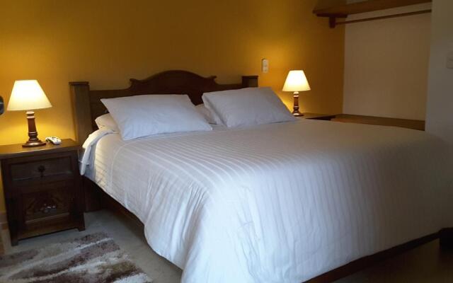 Отель Jardines de la Villa