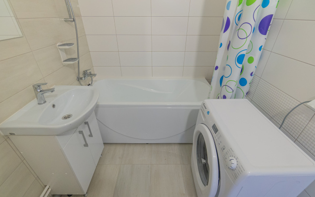 Апартаменты Двухкомнатная Квартира на Мансардном Этаже