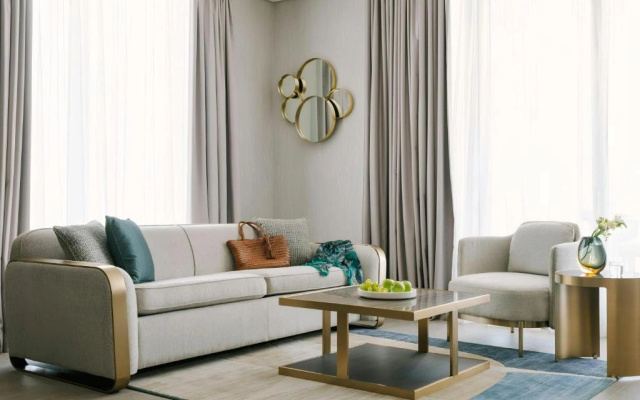 Отель Aura Suites Downtown