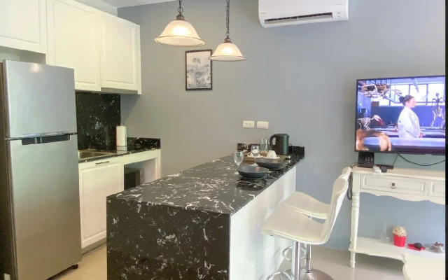 V Komplekse Palmyrah Apartment